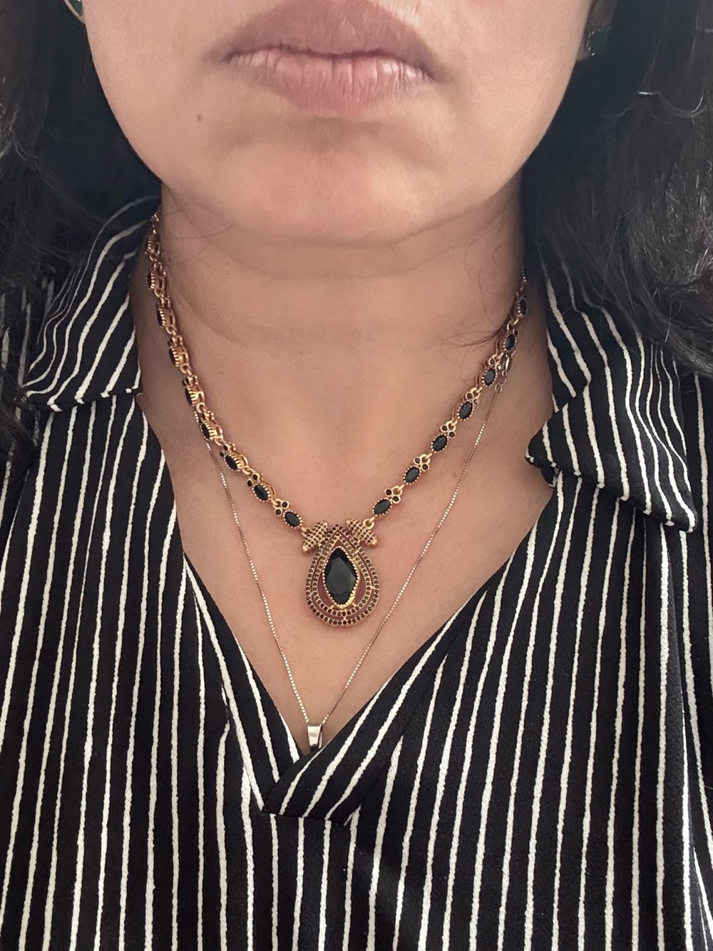 Gold Necklace with Black Teardrop Pendant